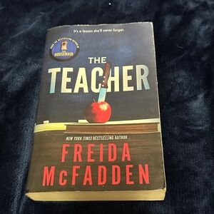 The Teacher by Freida McFadden - Paperback Book, Red/Black Cover